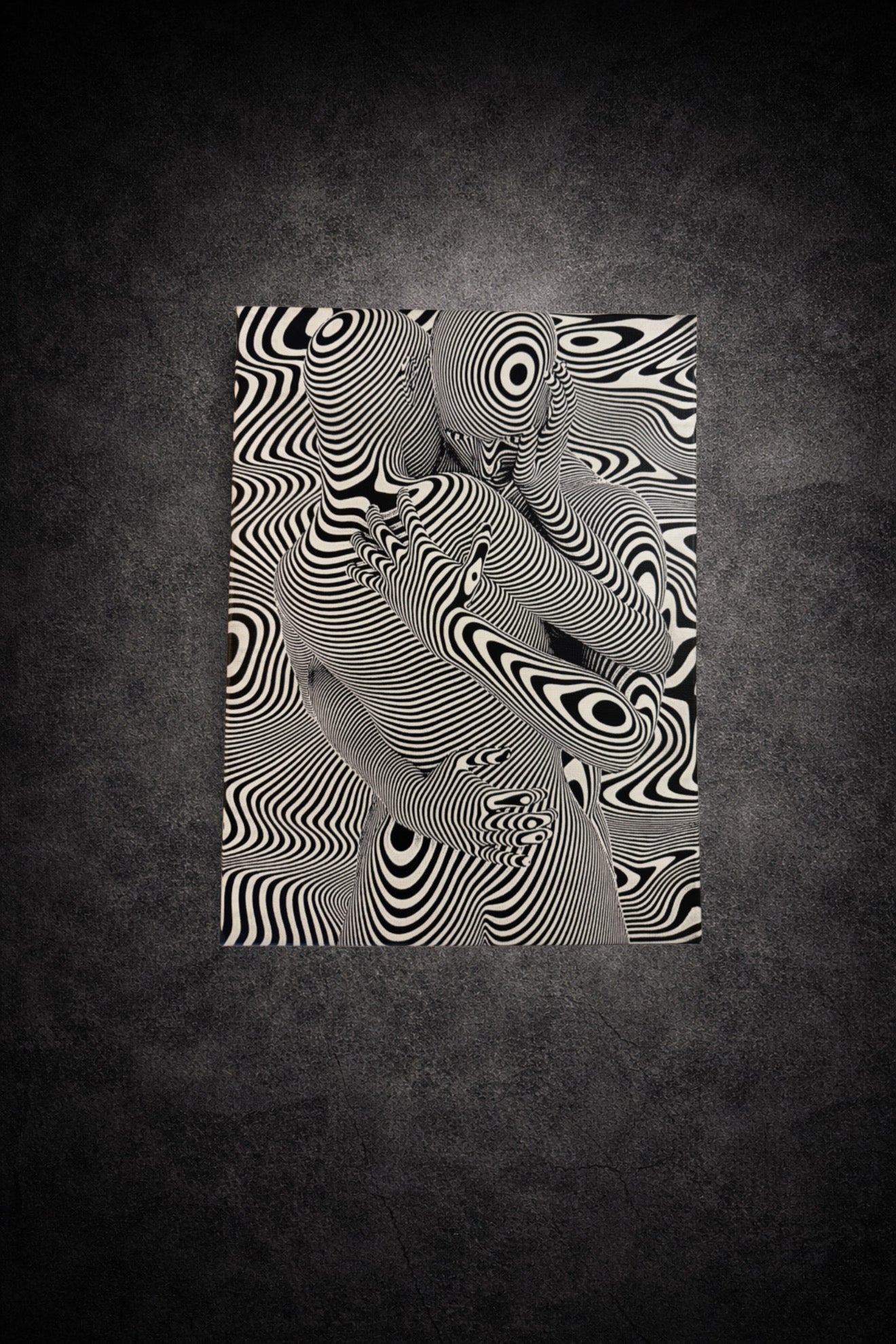 Tableau noir et blanc en illusion optique représentant deux silhouettes humaines