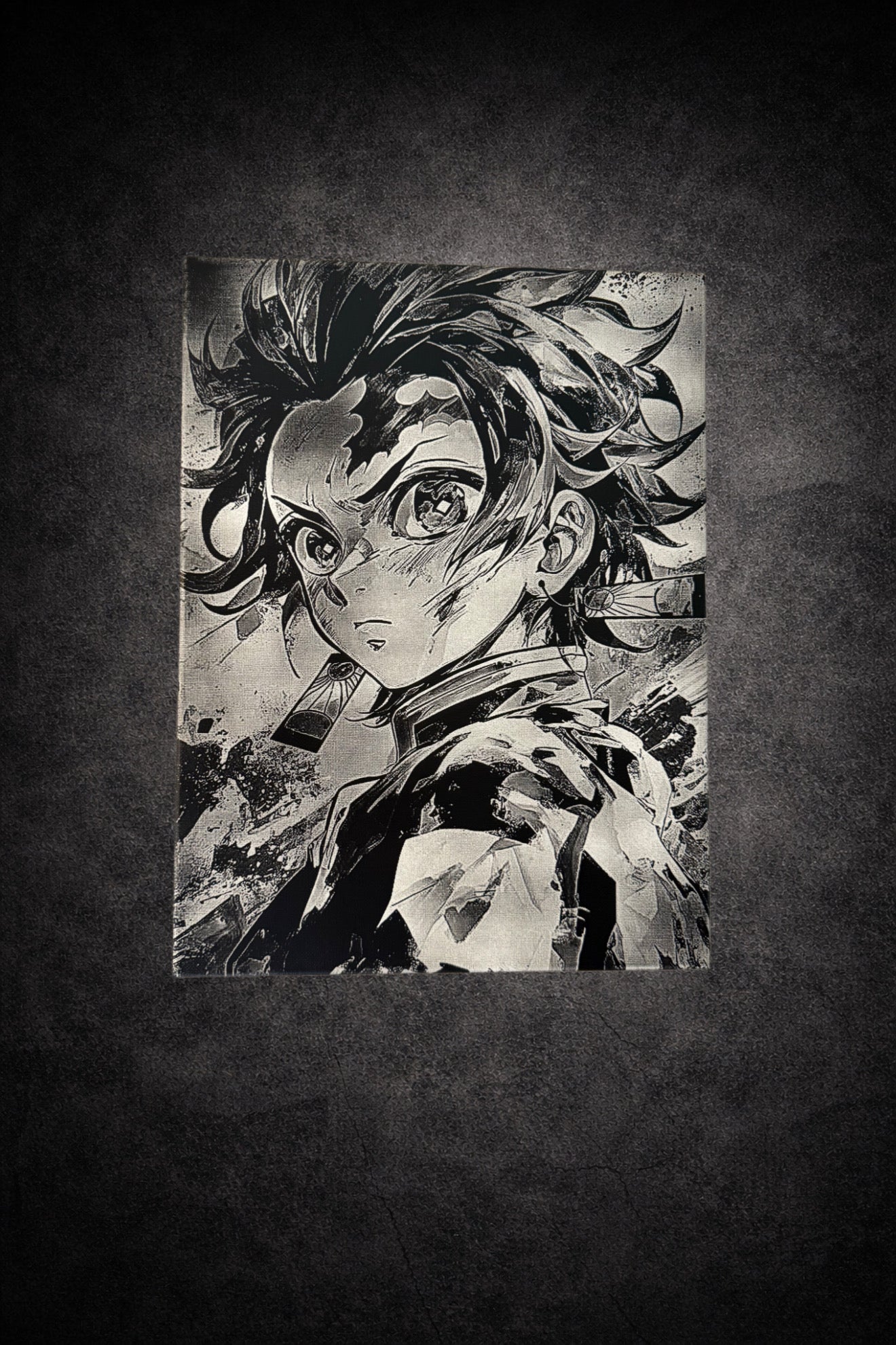 Tableau noir et blanc représentant un jeune guerrier au regard intense