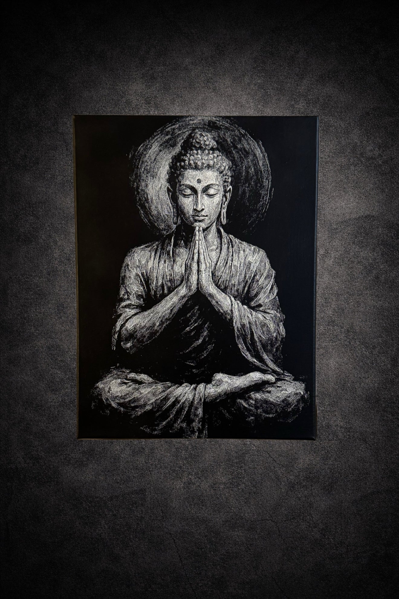 Tableau noir et blanc silhouette en méditation avec halo lumineux